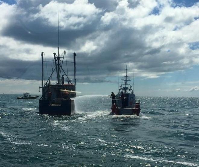 A 42-foot boat crew from U.S. Coast Guard Station Chatham help put out an engine room fire on a fishing vessel in Nantucket Sound on May 11, 2017. The fishing vessel Jupiter reported the fire over VHF Ch. 16 at about 8:50 a.m.  © U.S. Coast Guard